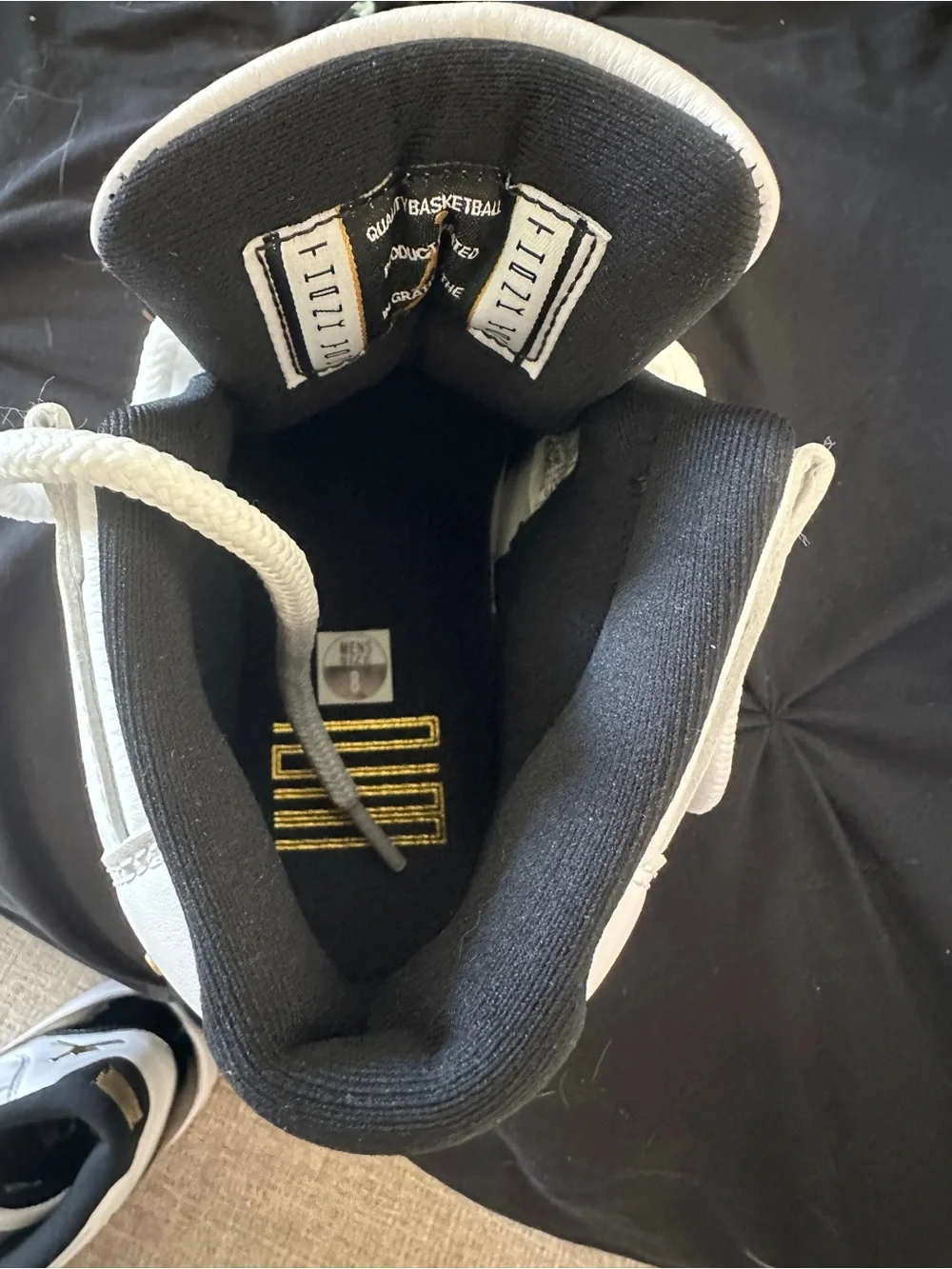 Air Jordan’s 11 Never Been Worn Black and White High-Top Athletic Sneakers